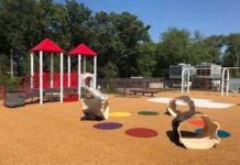 How important is a safe surface for a playground?
